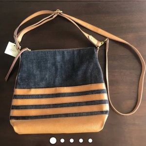 Fossil hobo style purse with denim and leather